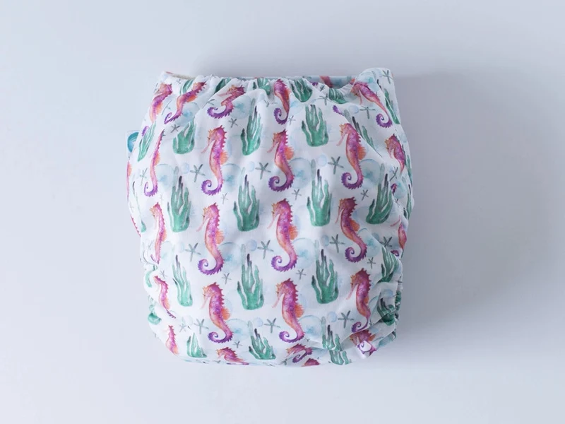 EcoTiny - pocket con tasca in cotone cavalluccio marino