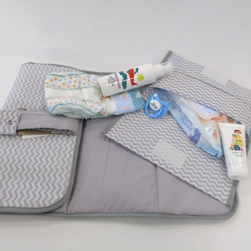 SET PORTA PANNOLINI DA VIAGGIO + FASCIATOIO PORTATILE