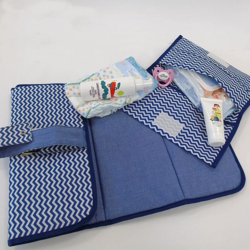 SET PORTA PANNOLINI DA VIAGGIO + FASCIATOIO PORTATILE